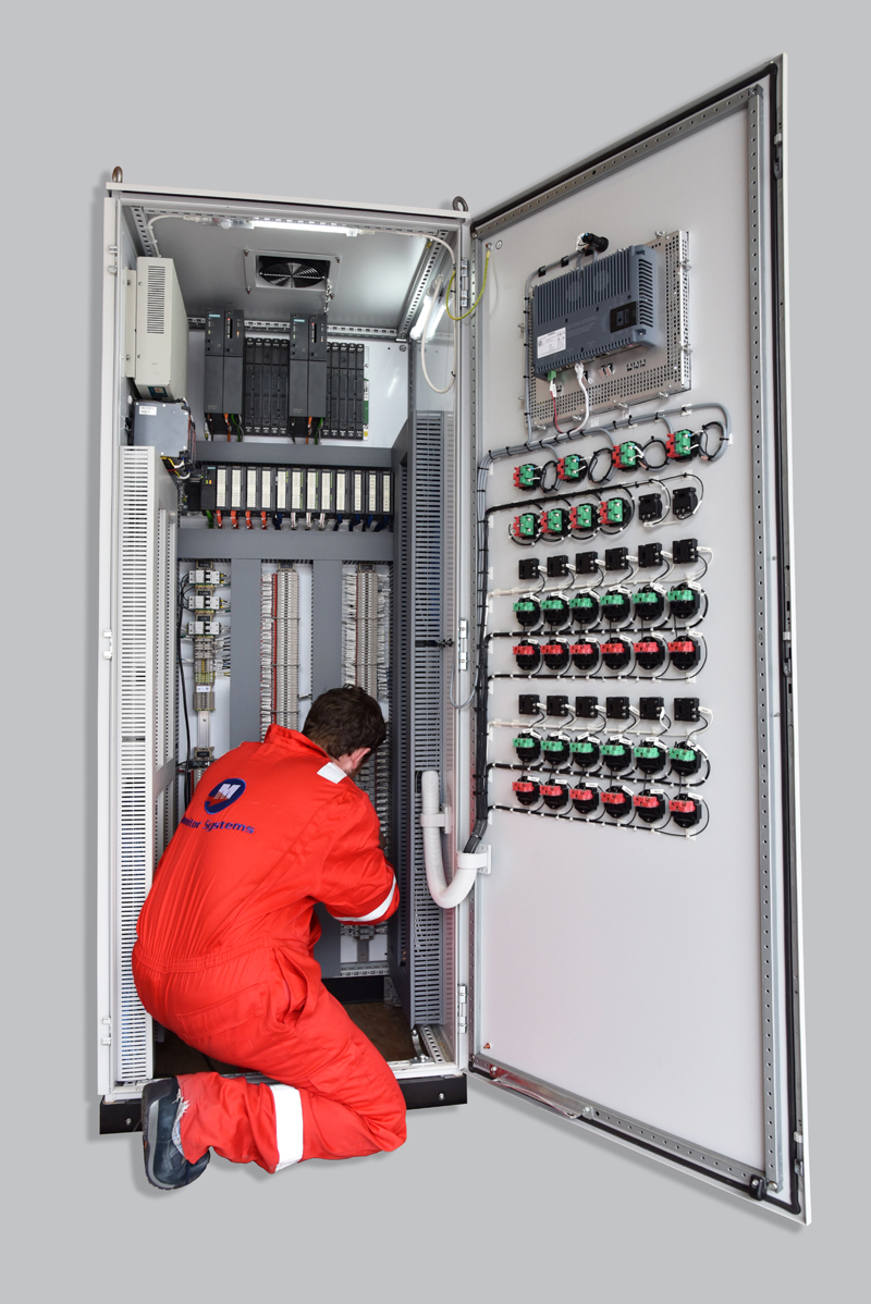 Engineer commissioning the main ESD control enclosure