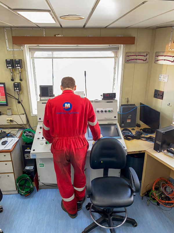 Monitor Systems engineer commissioning RPD equipment from a jack-up control room